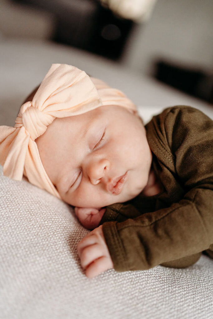 Newborn baby girl for newborn photos.