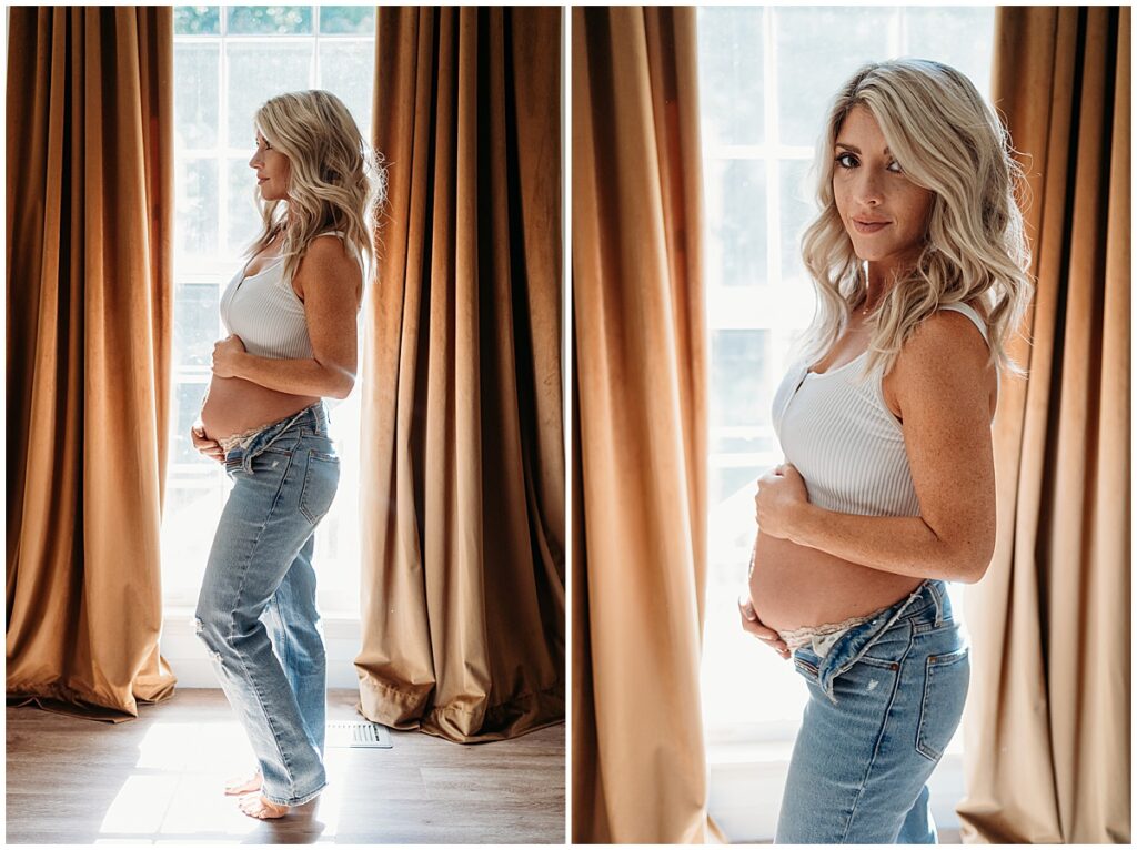 Mom holding pregnant belly showing when to take maternity photos.