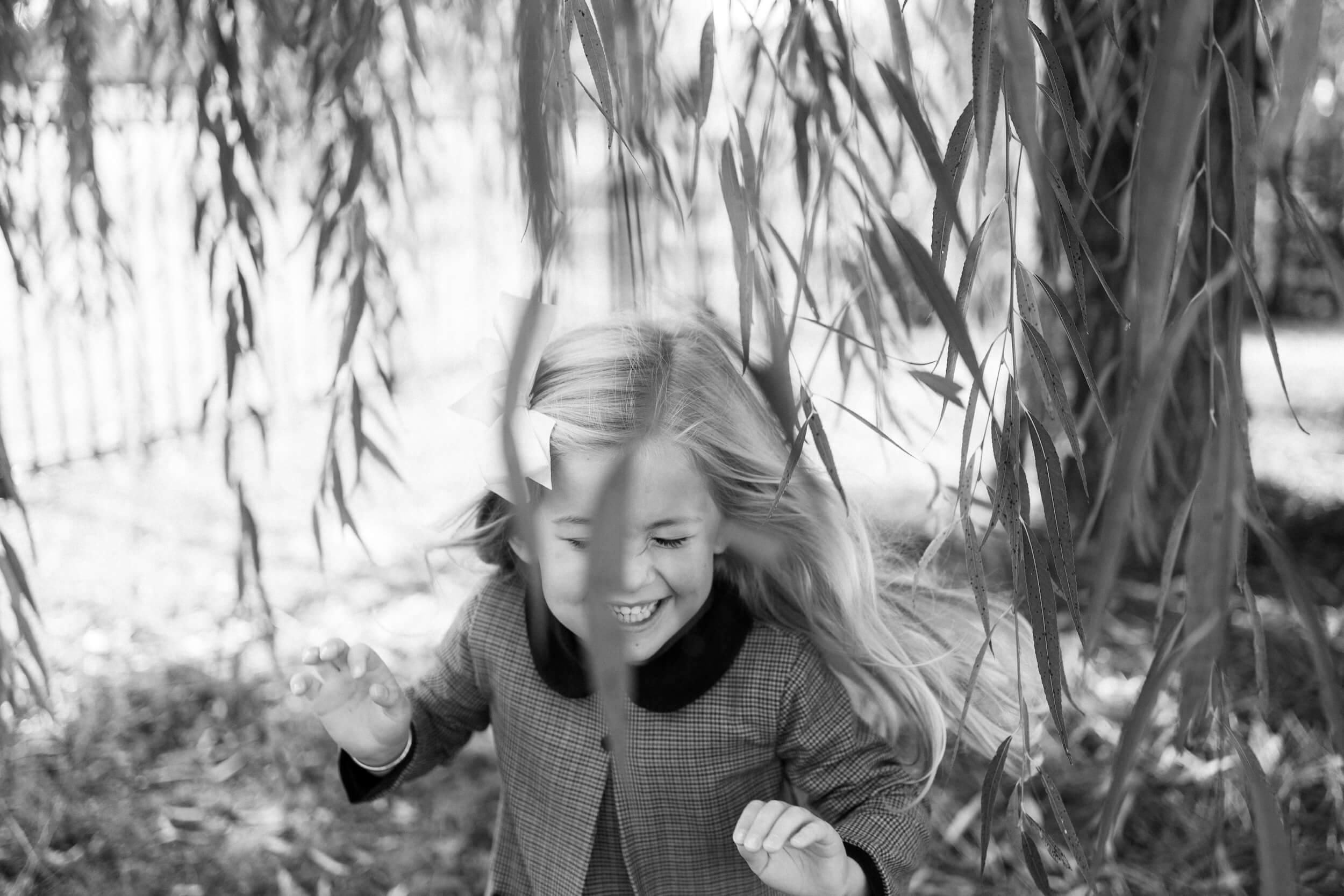 Child playing in the tree.